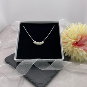 18th twisted rings necklace