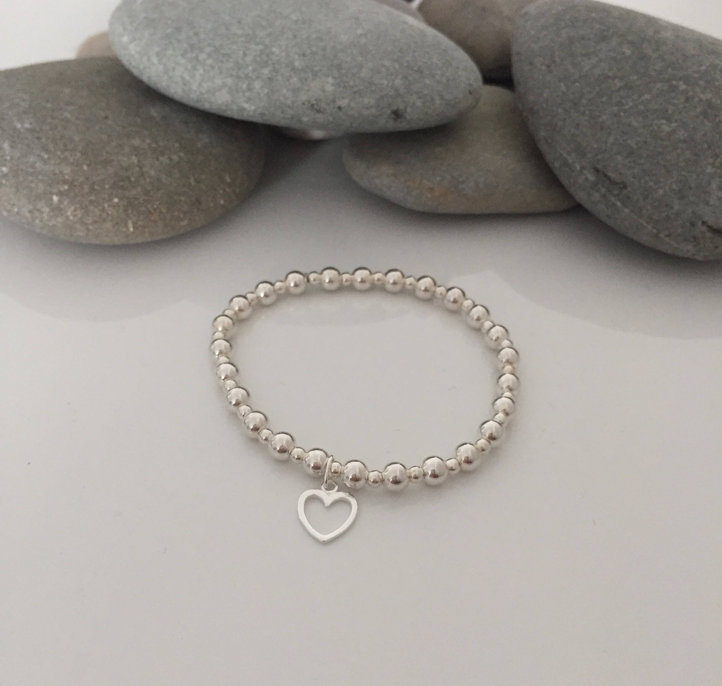 sterling silver stretch bracelet with sterling silver heart charm 5e4571a8